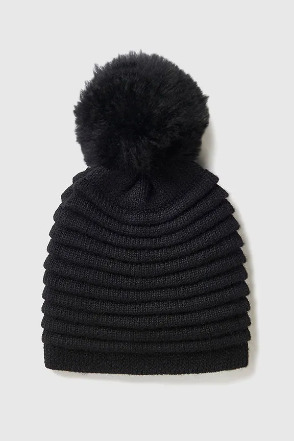 SENTALER BLACK ADULT RIBBED HAT WITH OVERSIZED FUR POMPON