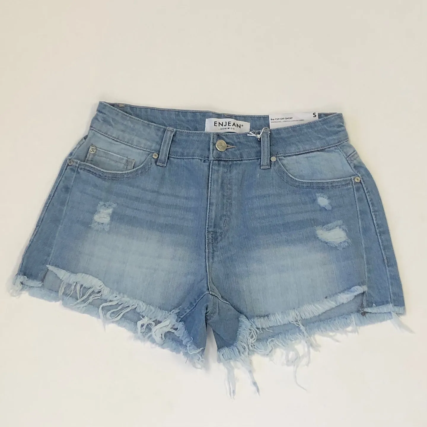 Woman's Highrise Destructed Denim Short